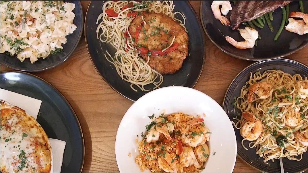 A table of Mamma Lucia entrées ready to serve